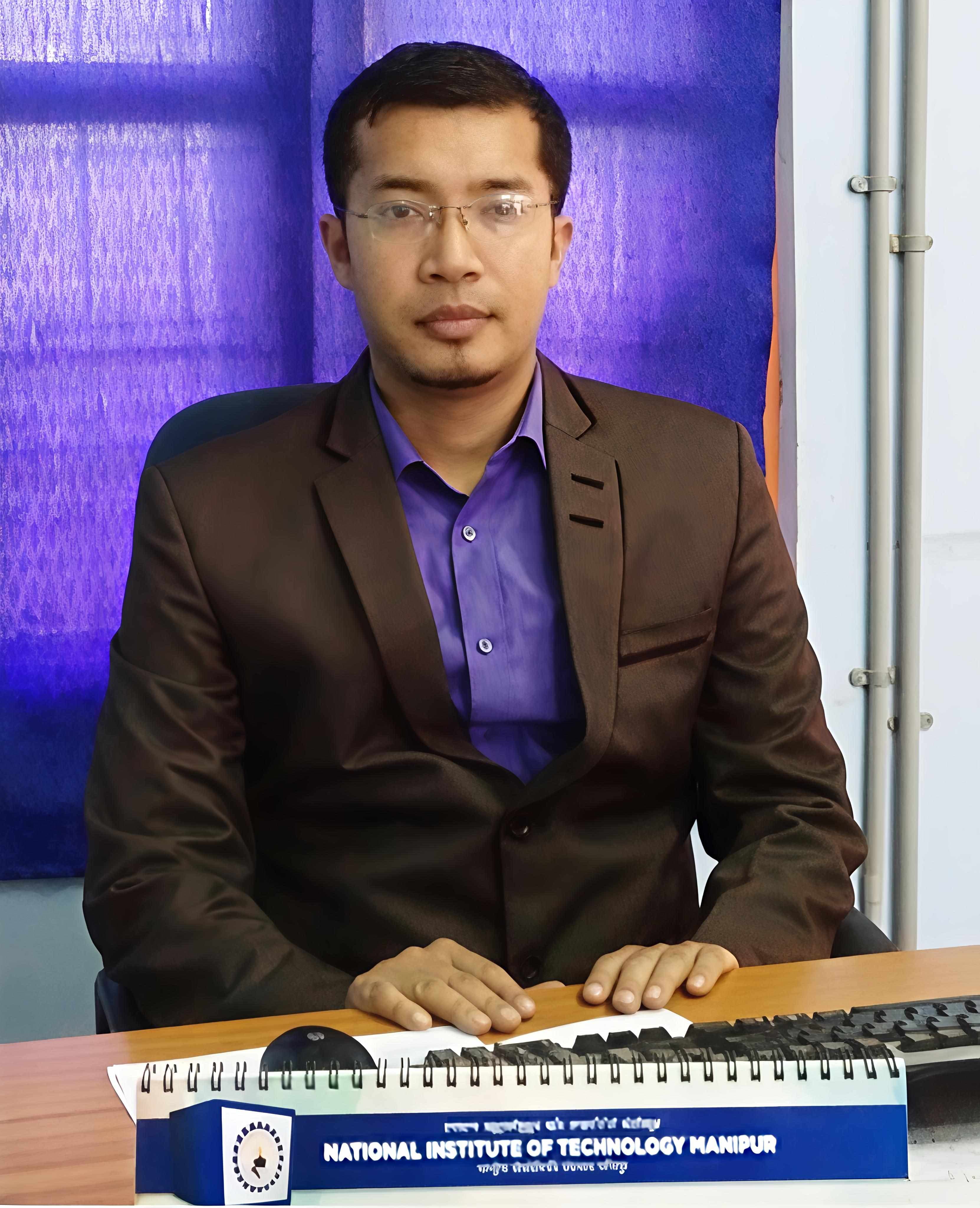 Dr.Kh Johnson Singh
